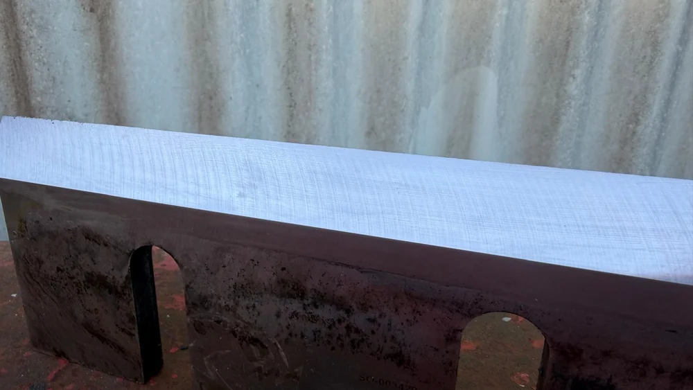 Freshly sharpened wood chipper blade at our Surrey yard A freshly sharpened wood chipper blade with a bright clean cutting edge at our Leatherhead, Surrey yard